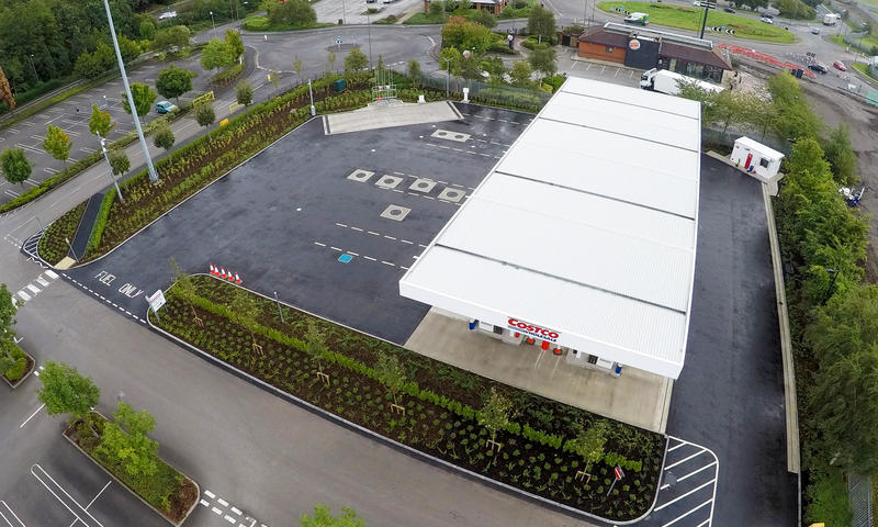 drone shot of costco petrol station with landscape renovation
